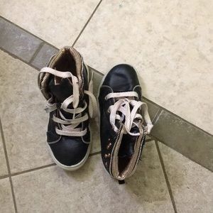 Pink gold and black shoes